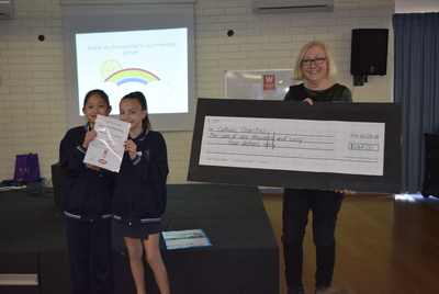 St Augustine's Parish School Fun Day Cheque handover.jpg